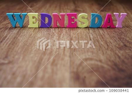 wednesday alphabet letter with space copy on wooden background wednesday alphabet letter with space copy on wooden background 109038441