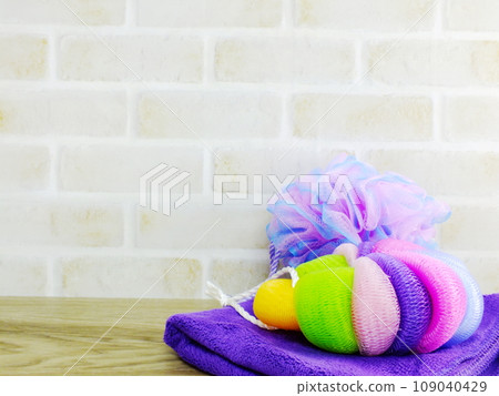 soft bath puff and towel with space copy background 109040429