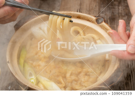 Nabeyaki udon with chopsticks Nabeyaki udon with chopsticks 109041359