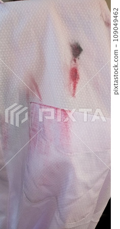 A dress shirt washed with a ballpoint pen in the pocket A dress shirt washed with a ballpoint pen in the pocket 109049462
