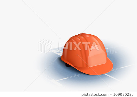 an orange color helmet lying on blueprint 109050283