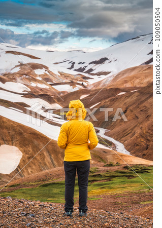Young asian traveler woman enjoying in Kerlingarfjoll volcanic mountain on geothermal area in summer Young asian traveler woman enjoying in Kerlingarfjoll volcanic mountain on geothermal area in summer 109050504