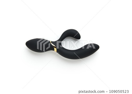 Black vibrator on the white background. Sex toys for adults. Flat lay, top view Black vibrator on the white background. Sex toys for adults. Flat lay, top view 109050523