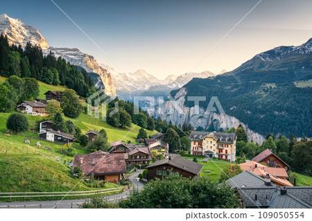 Wengen mountain village with Lauterbrunnen valley and Jungfrau mountain in the evening at Bern, Switzerland 109050554