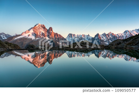 French alps landscape of Lac Blanc with Mont Blanc mountain range reflected on lake in the sunset at Chamonix, France 109050577