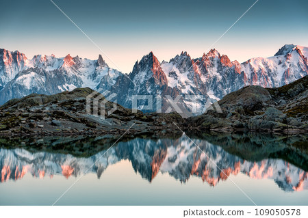 Lac Blanc with Mont Blanc mountain range reflect on the lake in French Alps at the sunset. Chamonix, France Lac Blanc with Mont Blanc mountain range reflect on the lake in French Alps at the sunset. Chamonix, France 109050578
