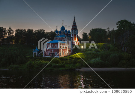 View of the Kazan Transfiguration Church from the Volga River at dusk 109050890