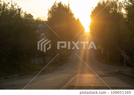 Empty city road at sunset. The road goes up. Success and growth concept. Beautiful city background 109051169