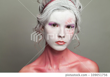 Closeup beaty portrait of woman with makeup. Halloween and theatre concept. 109051756