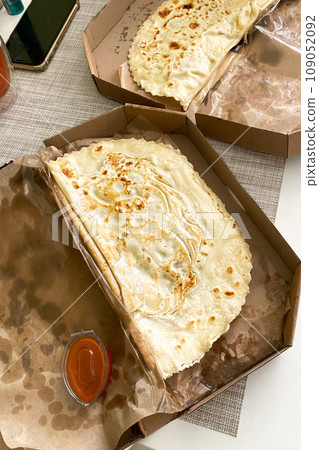 Yantyk is a national dish of Crimean Tatar cuisine. Deep fried turnover with a filling of ground or minced meat and onions. Prepared in the same way as cheburek, but fried without oil. Take away. 109052092