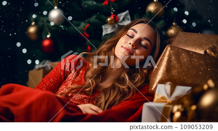 Beautiful woman laying in front of christmas tree with her eyes closed. Generative AI 109053209