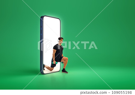 Creative collage with photo and 3d model phone. Young man doing exercises with dumbbells against green background. 3D rendering. 109055198