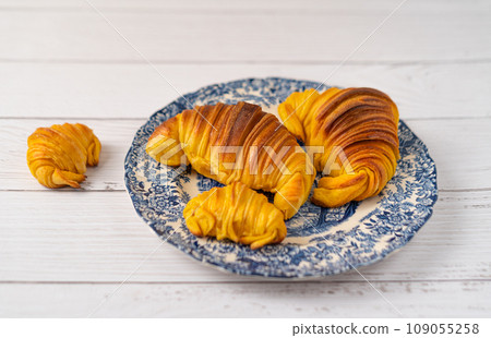 Portuguese Brioche Croissants on white table Portuguese Brioche Croissants on white table 109055258