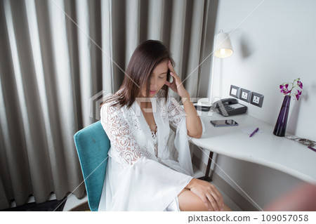 A woman having a headache. A woman having a headache. 109057058
