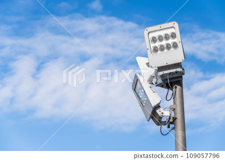 Blue sky and floodlight Blue sky and floodlight 109057796
