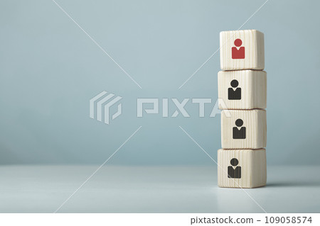 Assembled wooden cubes on the theme of business leadership 109058574