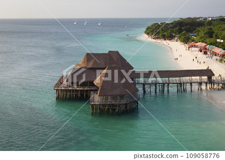 wonderful thatch stilt house restaurant at Kendwa beach at sunny day 109058776