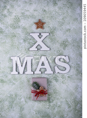 Wooden letter XMAS, Christmas festive card 109059445