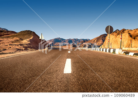 Road in the desert in Egypt. Freeway, highway through the desert Road in the desert in Egypt. Freeway, highway through the desert 109060489