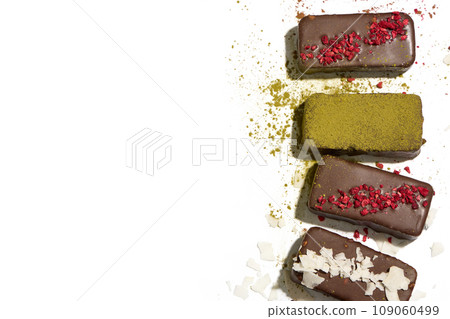 Healthy vegan bars with carob and dried fruits on white background 109060499