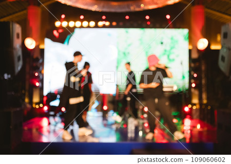 Texture blur and defocus, background for design. Stage light at a concert show. Texture blur and defocus, background for design. Stage light at a concert show. 109060602