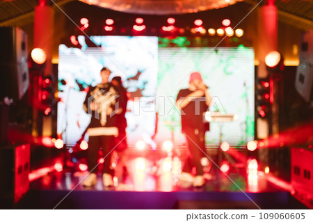 Texture blur and defocus, background for design. Stage light at a concert show. Texture blur and defocus, background for design. Stage light at a concert show. 109060605