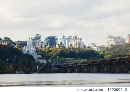 View of the big city on the hills over wide river. View at Paton bridge. Kyiv. Ukraine View of the big city on the hills over wide river. View at Paton bridge. Kyiv. Ukraine 109060640