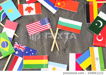 The concept is diplomacy. In the middle among the various flags are two flags - USA, Bulgaria 109061232
