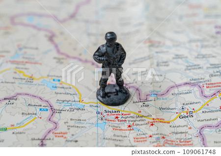 A metal toy soldier stands on the map of the Syunik region of Armenia A metal toy soldier stands on the map of the Syunik region of Armenia 109061748
