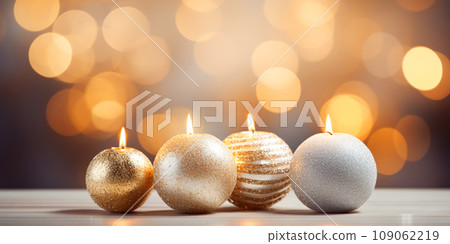 New Year and Christmas greetings banner. Gold and silver Christmas burning candles on background with bokeh New Year and Christmas greetings banner. Gold and silver Christmas burning candles on background with bokeh 109062219