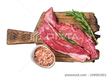 Butcher choise Bavette raw beef meat steak or flank flap on a wooden board with herbs. Isolated, white background. Butcher choise Bavette raw beef meat steak or flank flap on a wooden board with herbs. Isolated, white background. 109063801