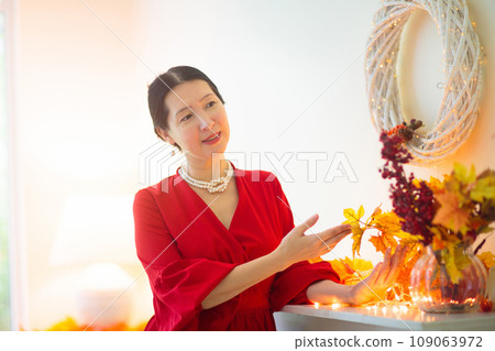 Asian woman at a party. Lady in elegant dress. 109063972