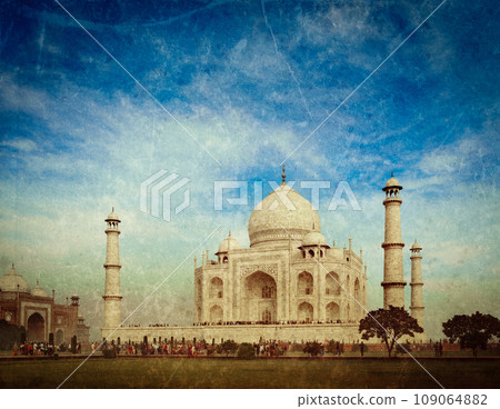 Vintage retro hipster style travel image of Taj Mahal. Indian Symbol - India travel background with grunge texture overlaid. Agra, India Vintage retro hipster style travel image of Taj Mahal. Indian Symbol - India travel background with grunge texture overlaid. Agra, India 109064882