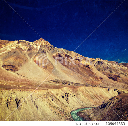 Vintage retro effect filtered hipster style travel image of Himalayan landscape in Hiamalayas near Baralacha La pass with grunge texture overlaid. Himachal Pradesh, India 109064883
