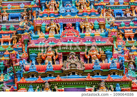 Sculptures on Hindu temple gopura tower. Meenakshi Temple, Madurai, Tamil Nadu, India 109064886
