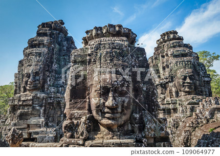 Ancient stone faces of Bayon temple, Angkor, Cambodia Ancient stone faces of Bayon temple, Angkor, Cambodia 109064977