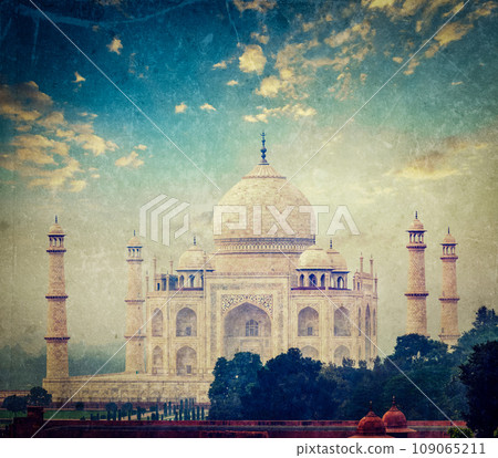 Vintage retro hipster style travel image of Taj Mahal on sunrise sunset, Indian Symbol - India travel background with grunge texture overlaid. Agra, Uttar Pradesh, India 109065211
