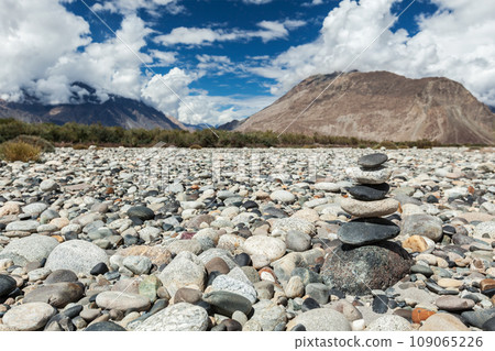 Zen balanced stones stack in Himalayas mountains. Nubra valley, Ladakh, Jammu and Kashmir, India 109065226