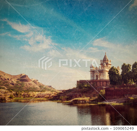 Vintage retro hipster style travel image of Jaswanth Thada mausoleum, Jodhpur, Rajasthan, India with grunge texture overlaid 109065249