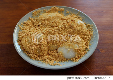 Soybean flour mochi placed on a wooden table Soybean flour mochi placed on a wooden table 109066406
