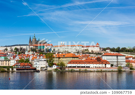 View of Charles bridge over Vltava river and Gradchany (Prague Castle) and St. Vitus Cathedral 109067759