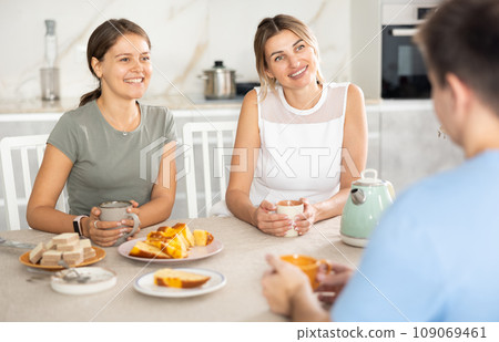 Young girl and guy have nice conversation with woman Young girl and guy have nice conversation with woman 109069461