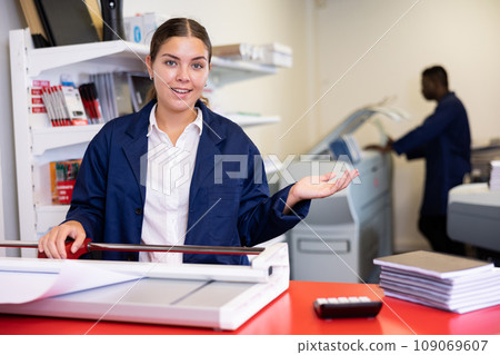 Friendly printing house worker invites you to visit office Friendly printing house worker invites you to visit office 109069607