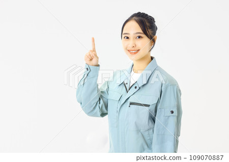 Woman dressed in work clothes Woman dressed in work clothes 109070887
