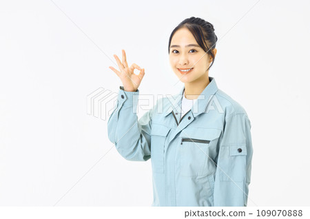 Woman dressed in work clothes Woman dressed in work clothes 109070888