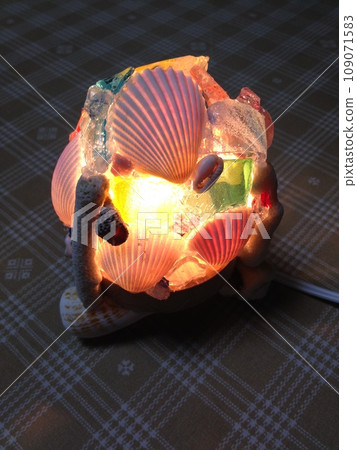 Handmade lantern made from shells Handmade lantern made from shells 109071583