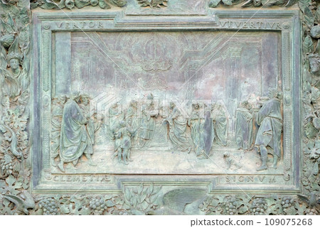 Presentation of Jesus at the Temple, detail of the central door of the Cathedral St. Mary of the Assumption in Pisa, Italy 109075268