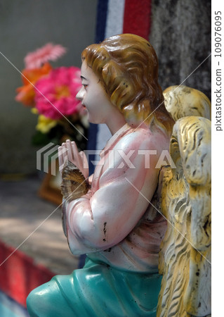 Angel at the Tomb of the Croatian Jesuit Missionary Ante Gabric Behind the Catholic Church in Kumrokhali, West Bengal, India 109076095