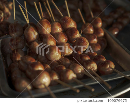 Thai street food in market. Isaan sausages. 109076675