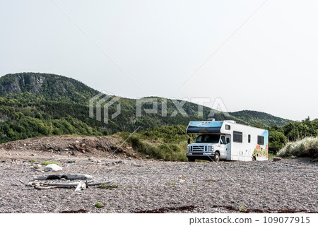 Camper RV truck parked at the Cape Breton Island Coast line cliff scenic Cabot Trail route, Nova Scotia Hghlands Canada 109077915